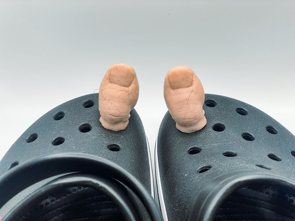 People are left disgusted by new Croc charms which look like your big toes  are peeping through the holes